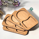 Wooden cup coasters with engraving
