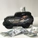 Money box in the shape of a car as a gift for a boy