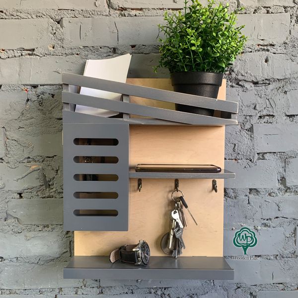 Shelf in the hallway made of wood for small items and keys
