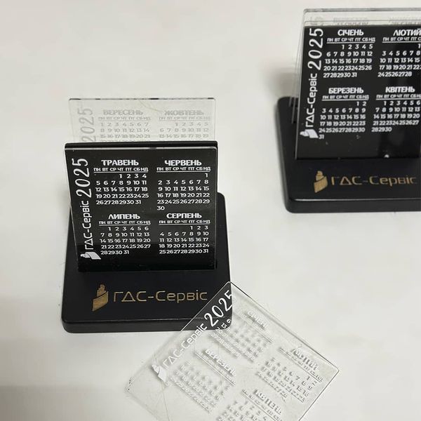 Desk calendar with acrylic inserts and company logo