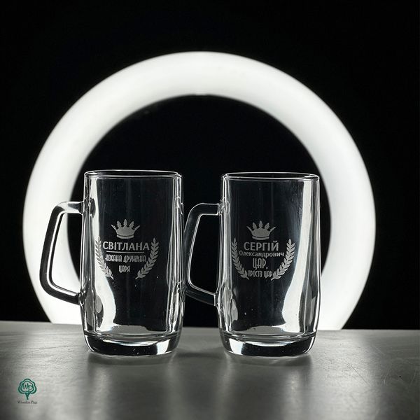 Paired beer glasses with engraving as a gift for a couple