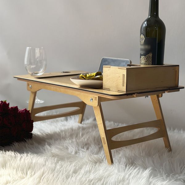 Breakfast in bed table as a gift for a woman