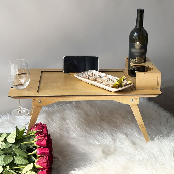 Breakfast in bed table as a gift for a woman