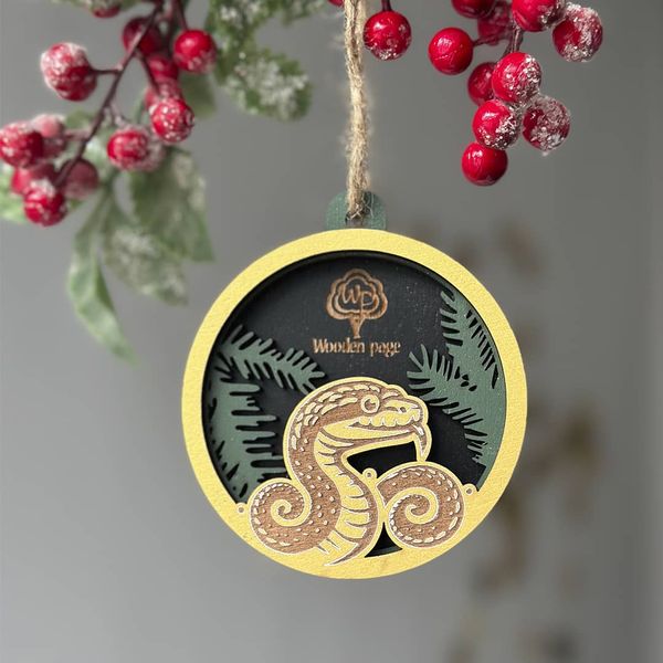 Christmas tree toy with company logo and snake