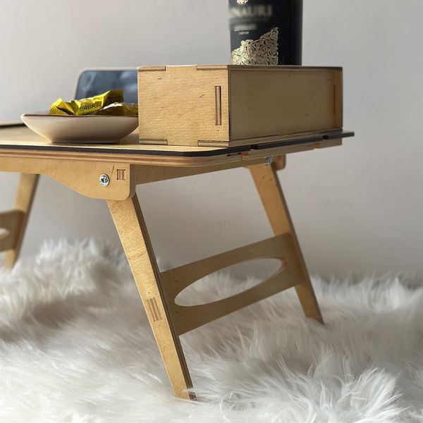 Breakfast in bed table as a gift for a woman