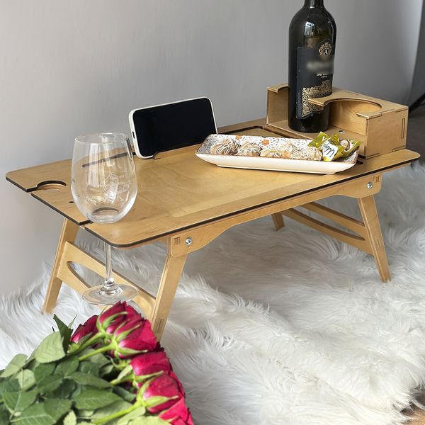 Breakfast in bed table as a gift for a woman