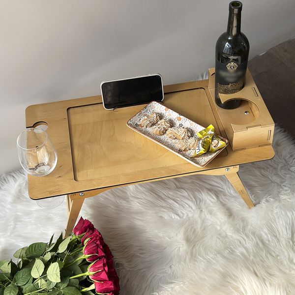 Breakfast in bed table as a gift for a woman