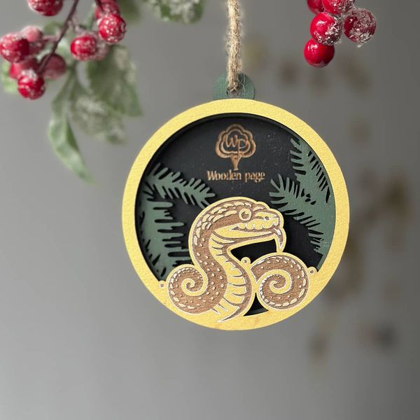 Christmas tree toy with company logo and snake