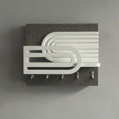 Wall-mounted key holder for the panel