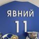 Football player's medal holder with name and number