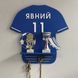Football player's medal holder with name and number