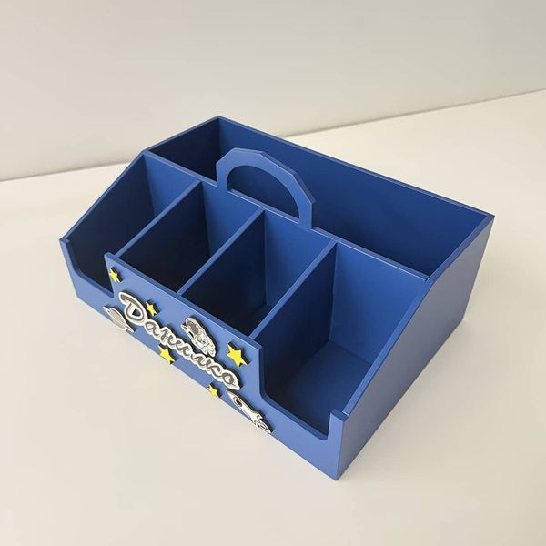 A desk organizer as a gift for a boy