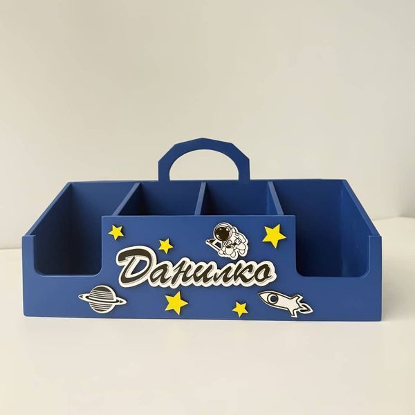 A desk organizer as a gift for a boy