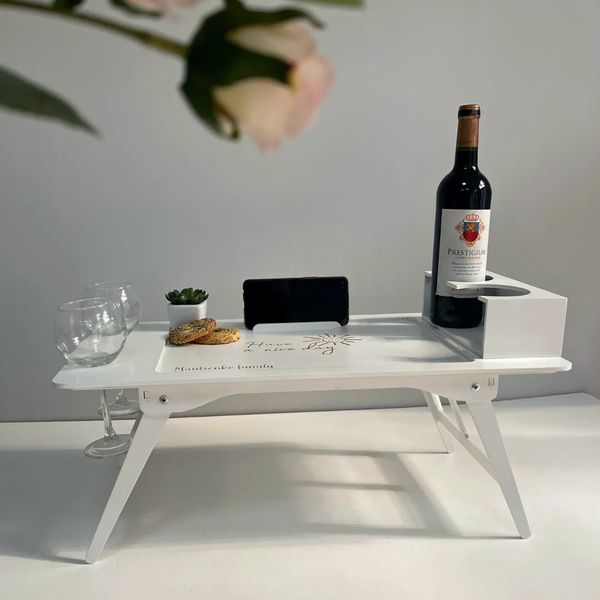 Дерев'яний розкладний столик у білому кольорі