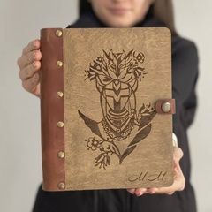 Notebook with engraved initials in Ukrainian style