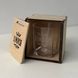 Whiskey glass in a wooden box