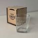 Whiskey glass in a wooden box