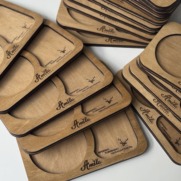 Wooden coasters and treats with the phrase