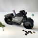 Interior piggy bank in the shape of a motorcycle