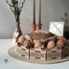 Wooden stand for Easter and Easter eggs with a bunny