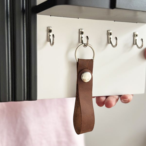 Miniature designer key holder for the wall