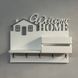 A key holder for the hallway with hooks in light colors