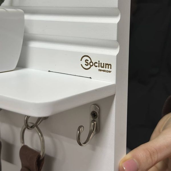 Designer mini key holder in white with logo