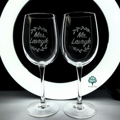 Paired wine glasses with "Mr&Mrs" engraving