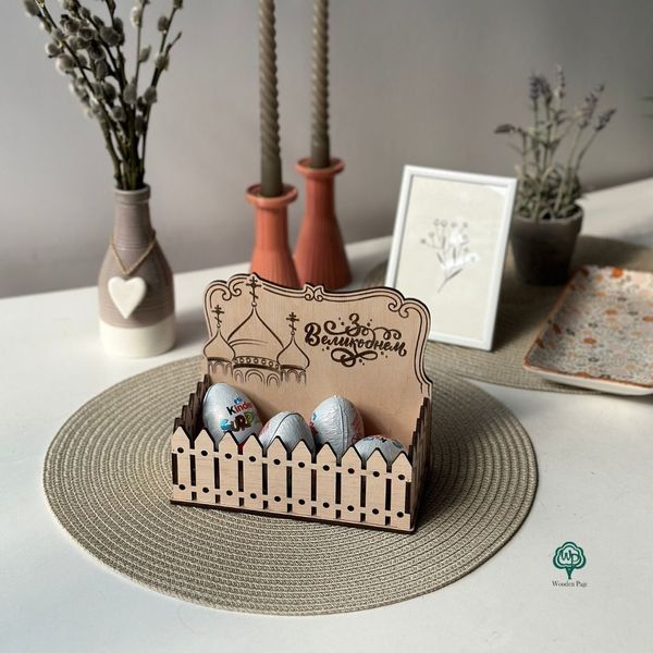 Wooden stand for Easter eggs for Easter with church