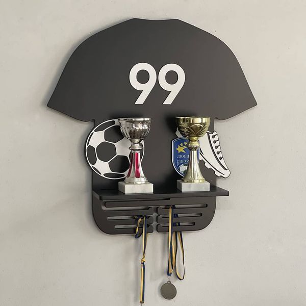 Shelf for cups and medals for a football player as a gift