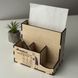 Organizer-stand on the teacher's desk with a print