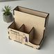Organizer-stand on the teacher's desk with a print