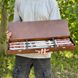 Skewers in a wooden box as a gift for the boss