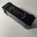 Black time capsule for a wine ceremony