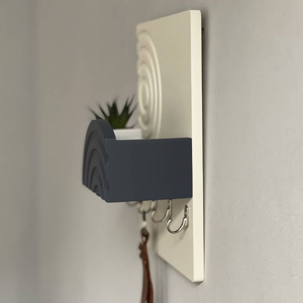 Designer key holder in milky graphite color