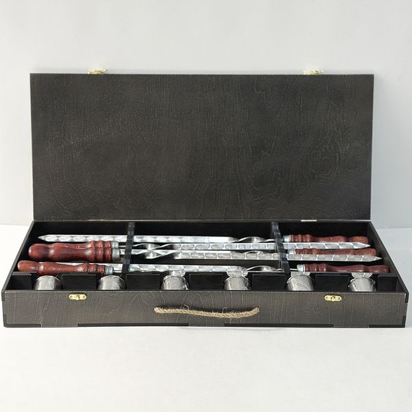 Set of skewers and glasses in a wooden case