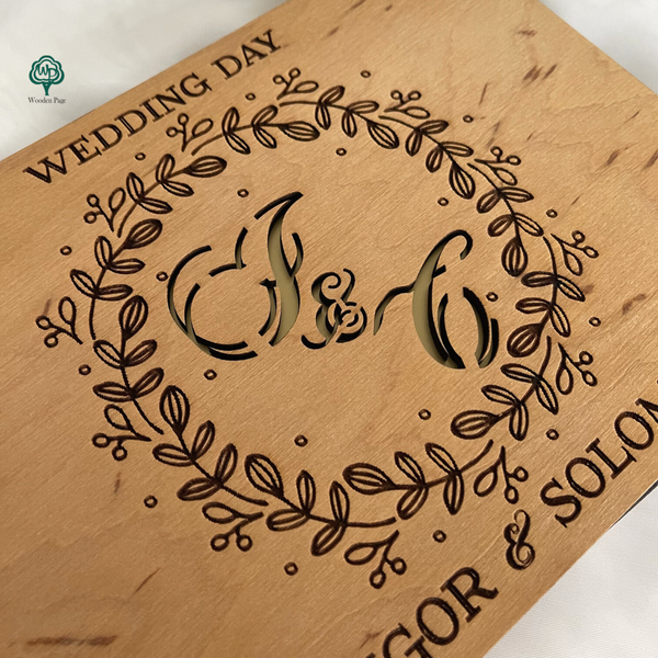 Весільна дерев'яна книга для фото та побажань на кільцях