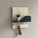Designer key holder in milky graphite color