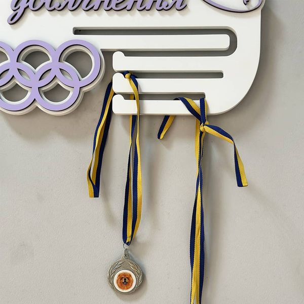 Gymnastics medal holder for a girl