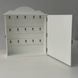 Designer key holder with a door in white