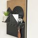 Designer key holder with a shelf on the shield