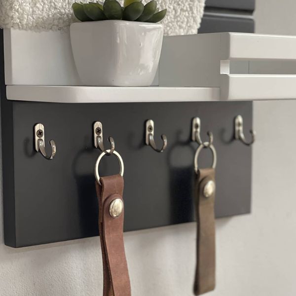 Designer key holder with faux fur in black and white