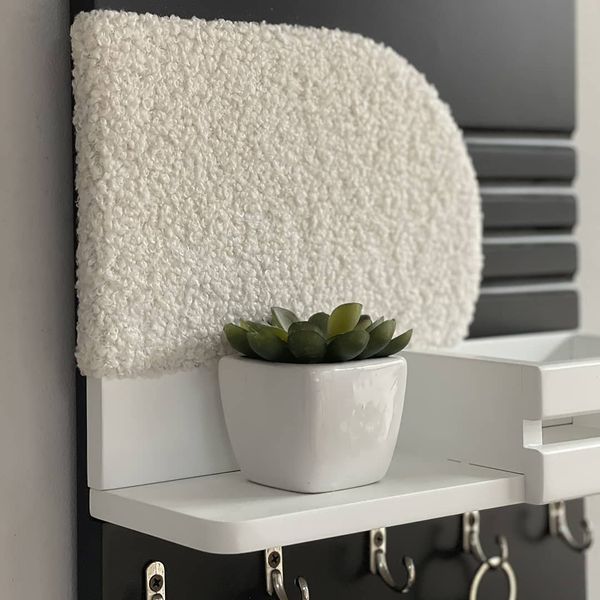 Designer key holder with faux fur in black and white