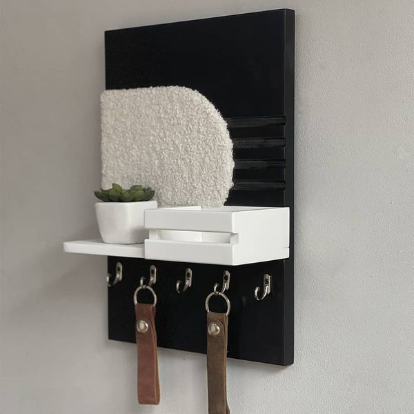Designer key holder with faux fur in black and white