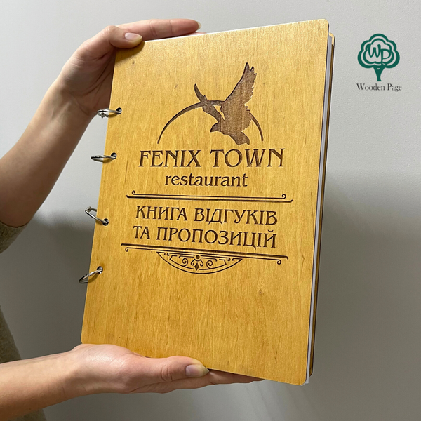 Book of reviews and suggestions in a wooden cover