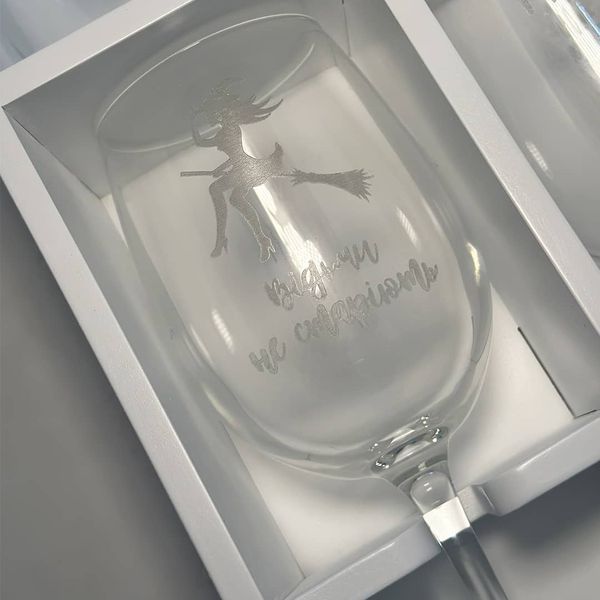 Set of wine glasses with engraving in a box as a gift for a friend