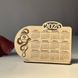 Desk calendar for 2025 with snake and logo