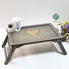 Wooden breakfast table with engraving