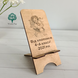 Wooden phone stand as a gift for a girl
