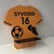 A shelf for football player awards and medals with a number